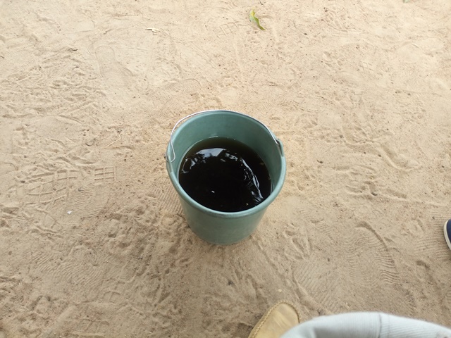 Prélèvement d'eau dans la rivière